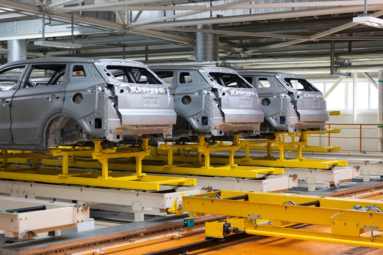 photo-automobile-production-line-welding-car-body-modern-car-assembly-plant-auto-industry-hightech-factory-1